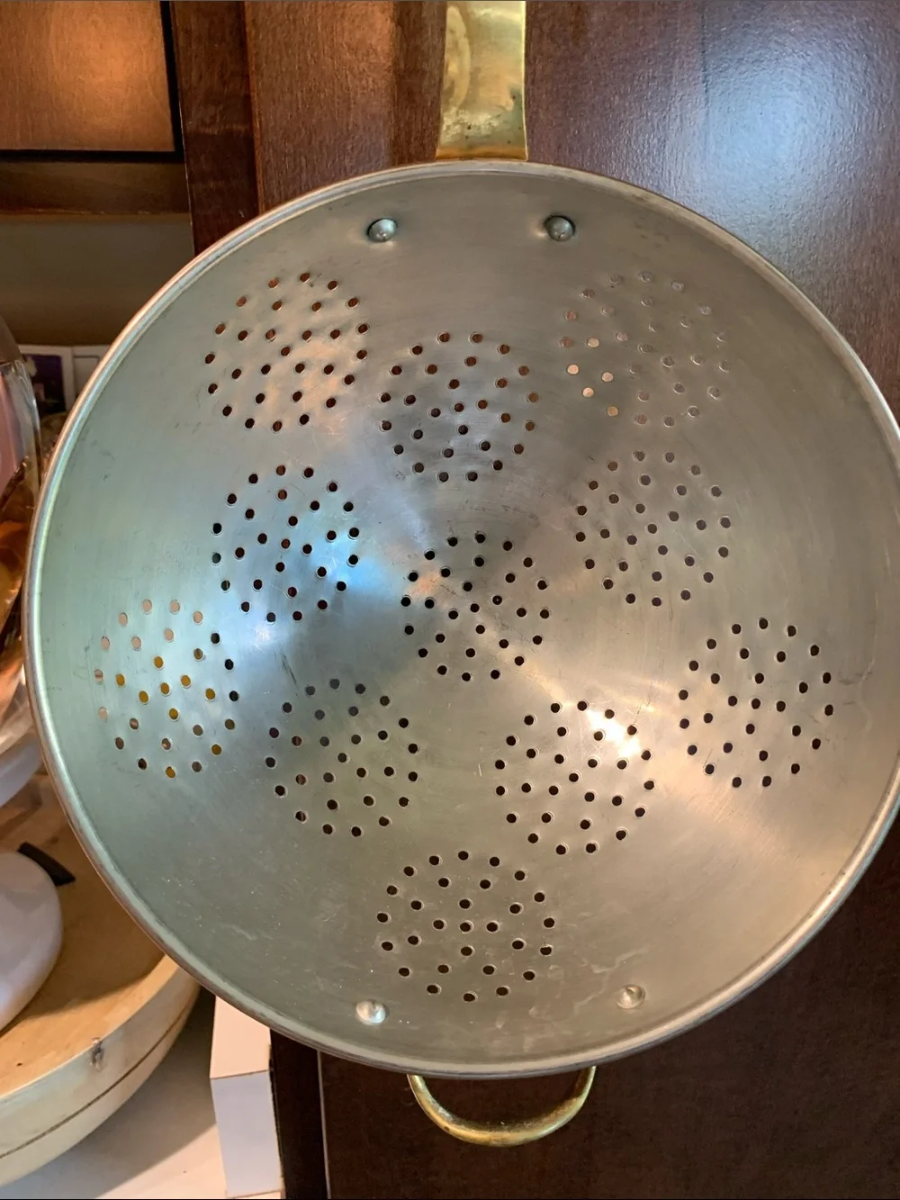 vintage copper colander strainer with a long brass handle 16”L